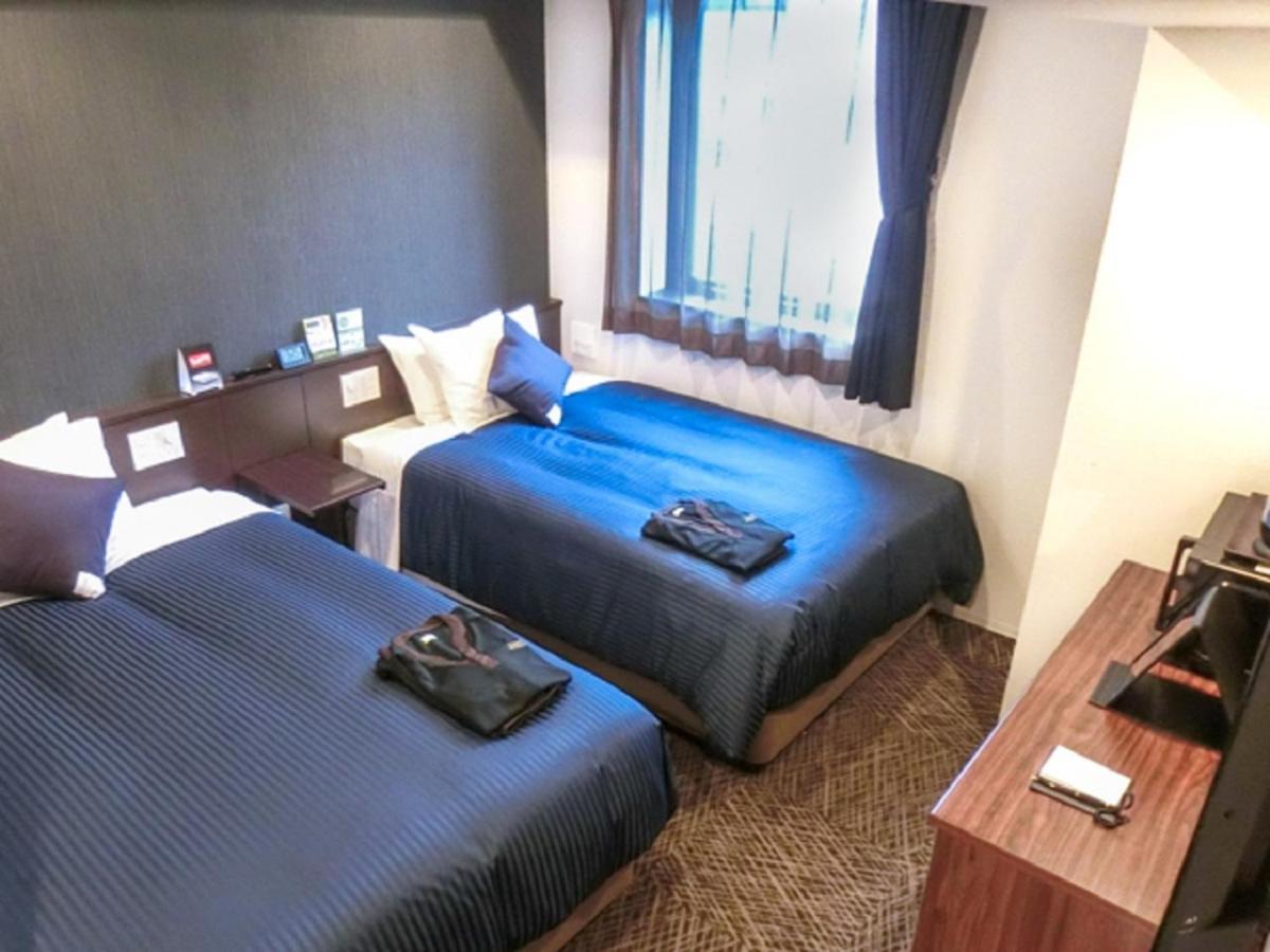 Natural Hot Spring Hotel Livemax Premium Hiroshima Exterior photo